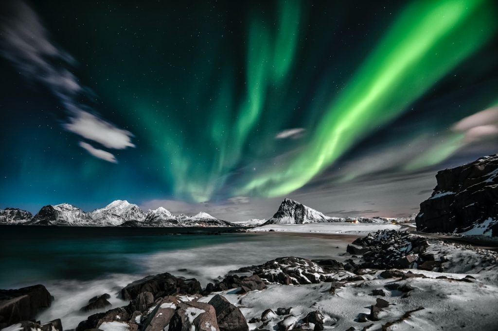 northern lights forming in the night