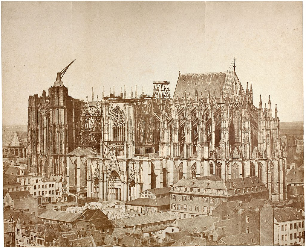 The unfinished cologne cathedral in 1855. The medieval crane was still in place, while constructions for the nave had been resumed earlier in 1814.