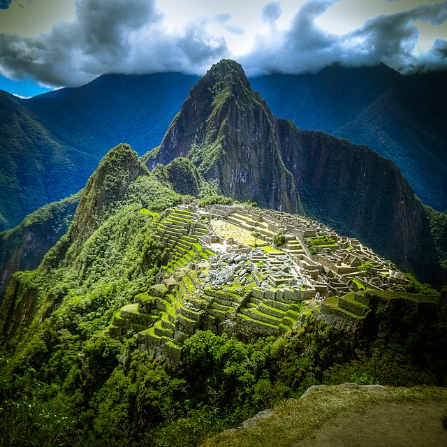Ascending to an impressive height of 2,693 meters (8,835 feet) above sea level, Huayna Picchu graces the skies with its presence, towering approximately 260 meters (850 feet) above Machu Picchu. 