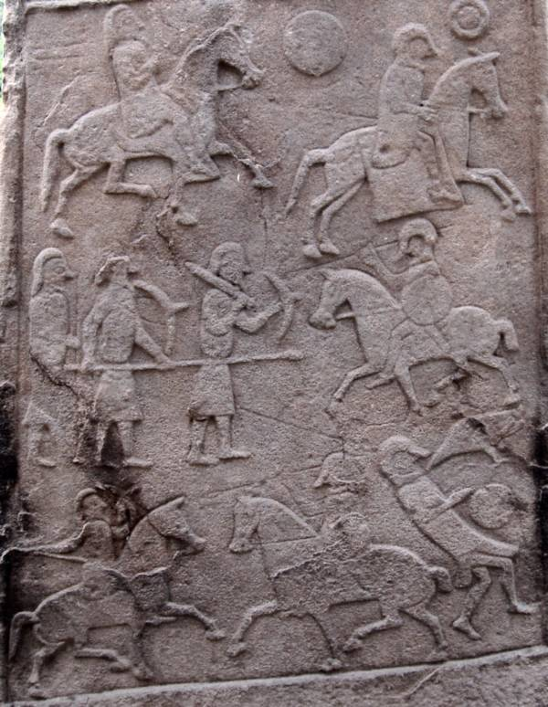 A stone carved by the Picts narrates a scene of conflict, likely depicting the Battle of Nechtansmere that took place in 685 AD.