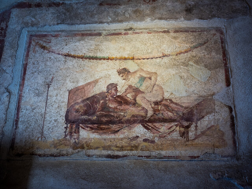 Sexual scene from a wall painting at the Lupanare