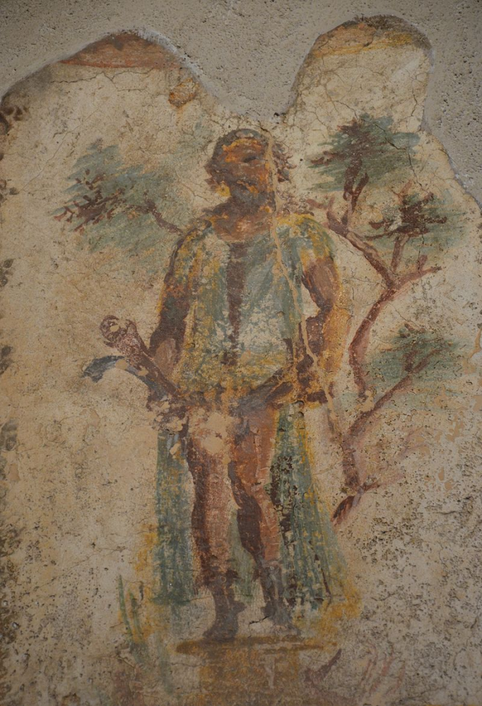 Wall painting of Priapus with two phalluses in the Lupanar