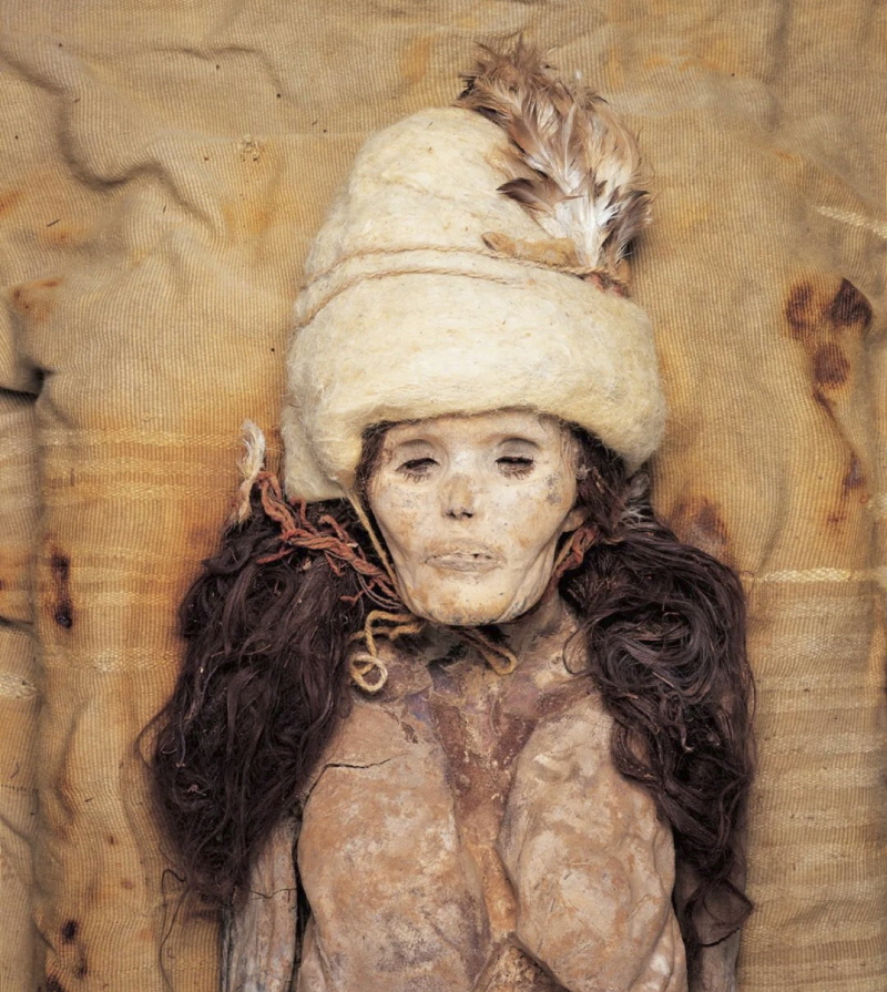 A naturally preserved female from burial M11 at the Xiaohe cemetery. Mummies of the Tarim Basin