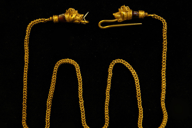 A Greek gold necklace featuring horned lion-head terminals. Originating from Cyprus in the 3rd century BC.  | Image Source: Biritish Museum