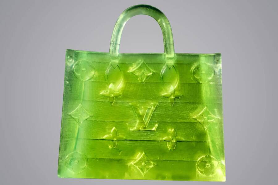 The microscopic features of the small bag can only be seen under a microscope, but it fetched a higher price at auction than the actual Louis Vuitton bags it is modeled after. 